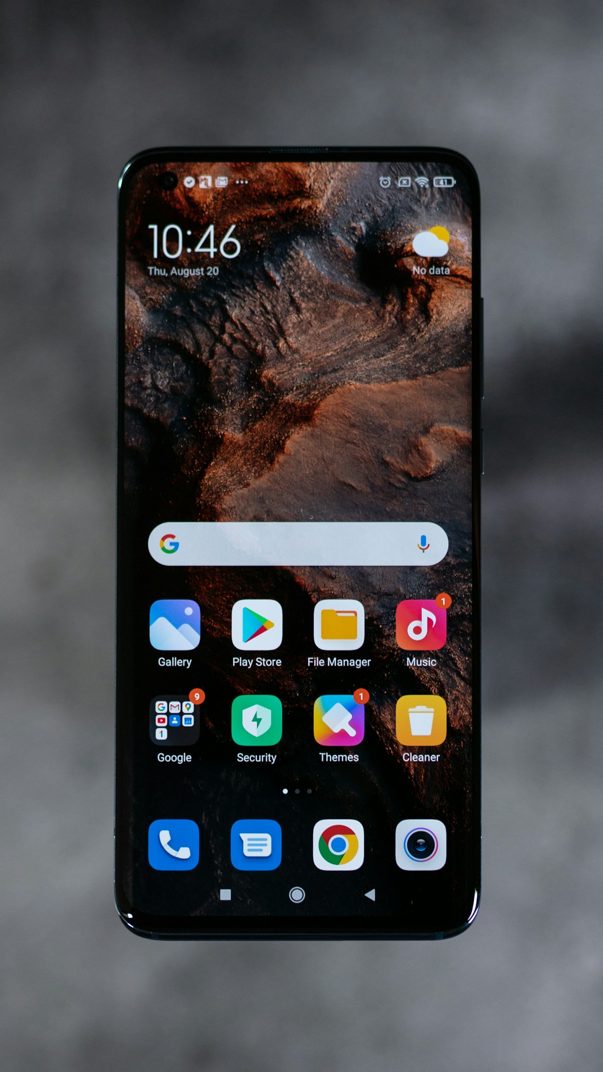 A Google Pixel and a Motorola Razr smartphone side by side.