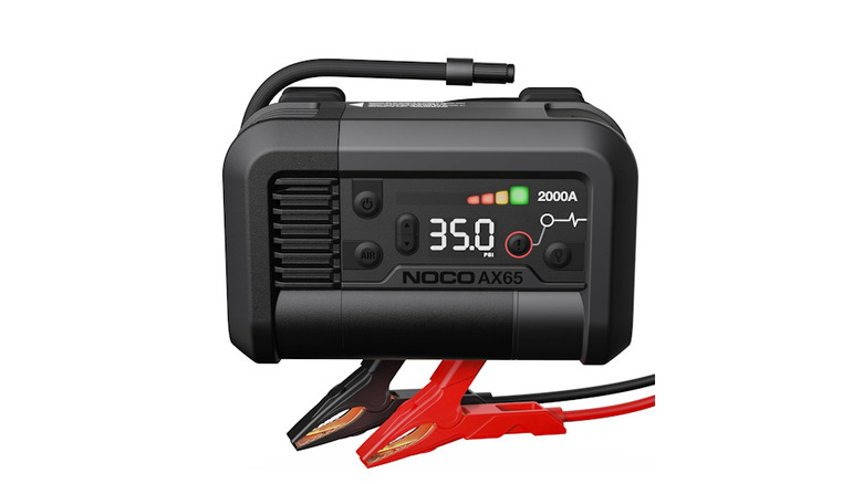 Noco Boost Air AX65 with PSI rating and battery charge active on front with air inflater and jumper cables out.