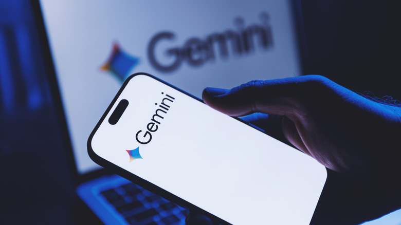 Google Gemini logo displayed on a mobile device and a laptop computer.