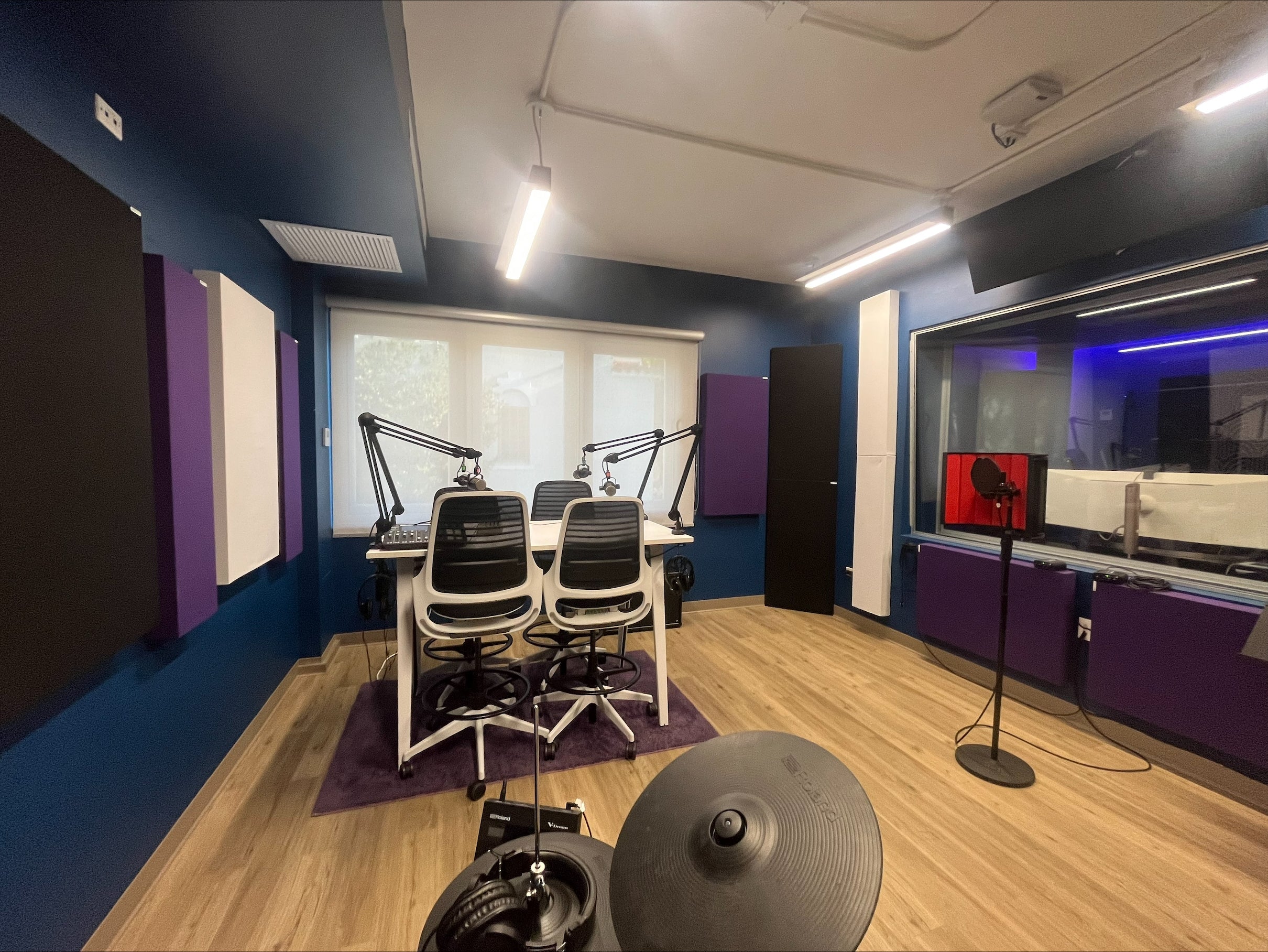 A high-quality bass trap panel mounted on an acoustic wall to control low-frequency resonance.