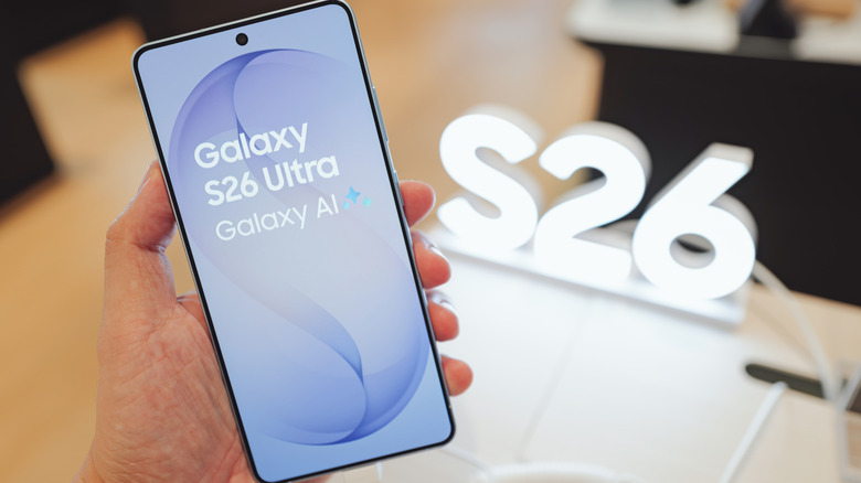 Product display showing Samsung S26 branding at a technology convention.