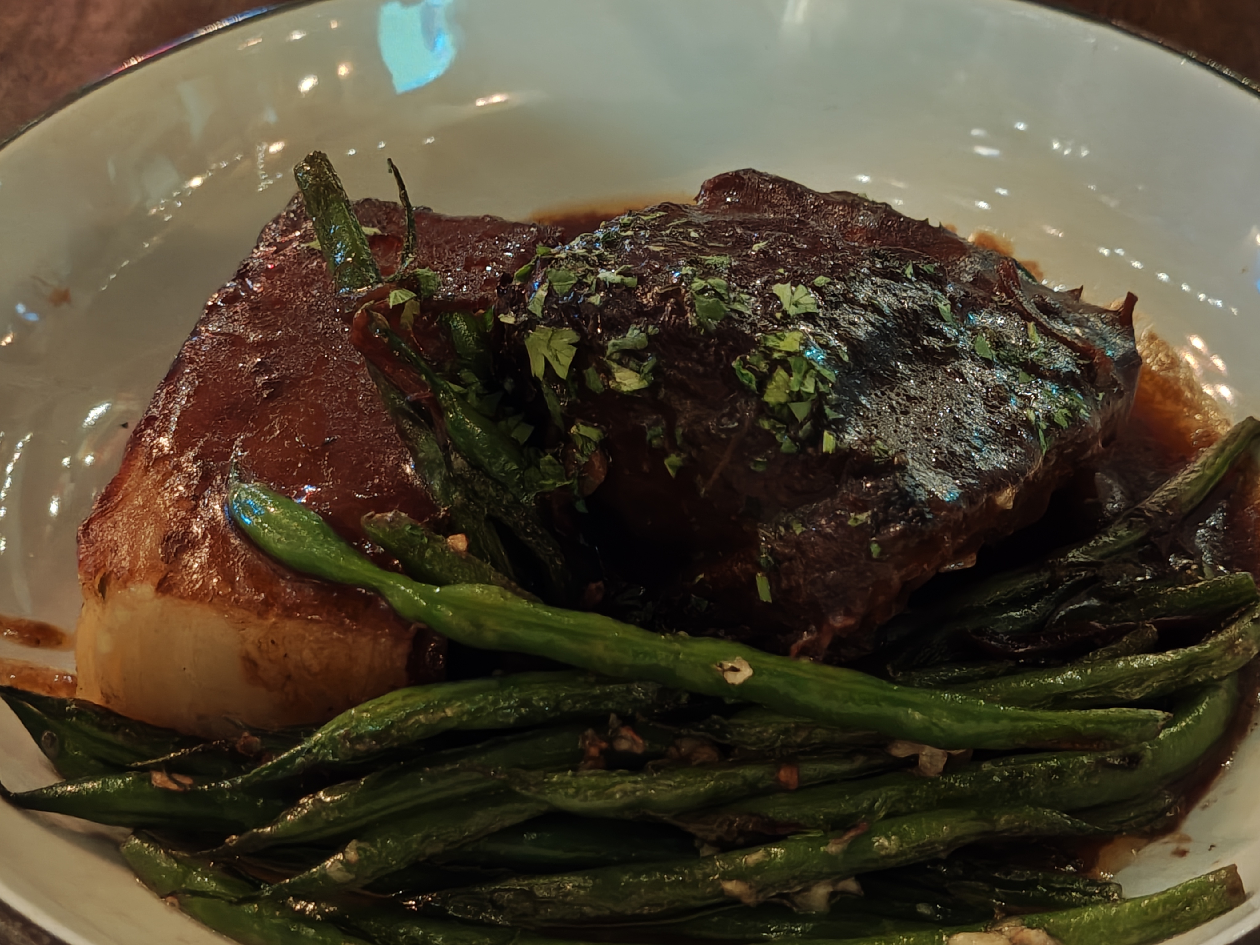 A detailed close-up photo of short rib at The Ordinarie Tavern taken with the Razr+ 2026 camera