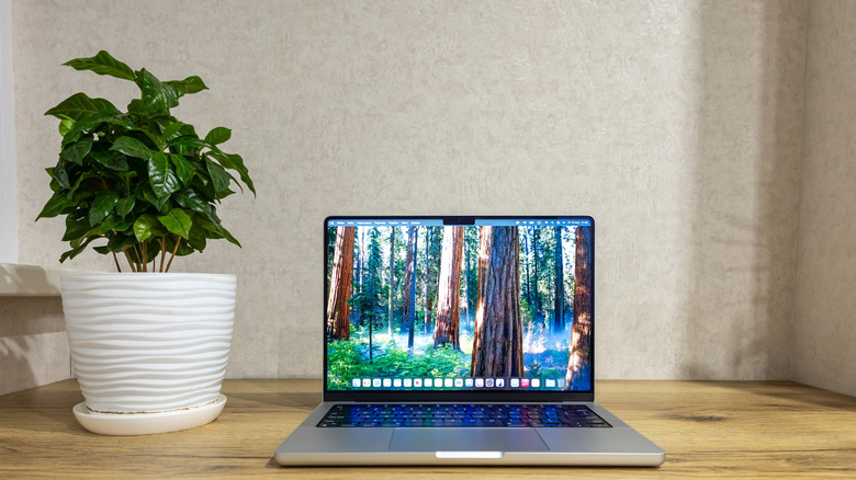 A MacBook Pro with M4 processor on a desk.