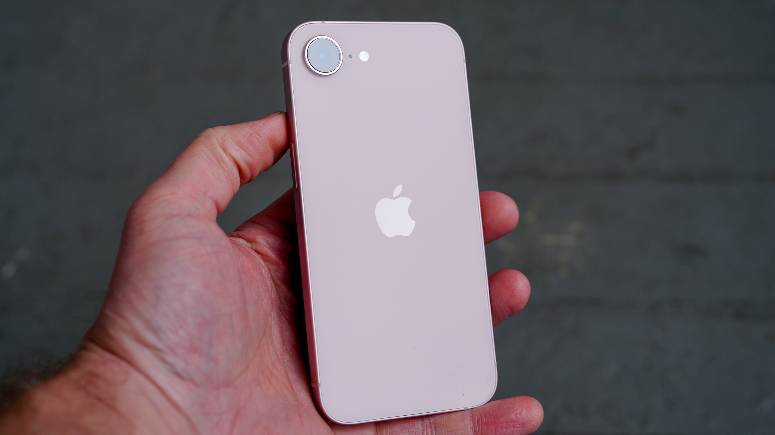 Close-up detail of the single 48MP Fusion camera lens on the back of the iPhone 17e.