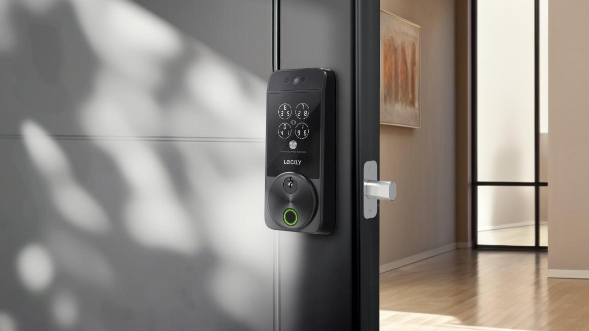 A modern smart lock with a keypad mounted on a front door.