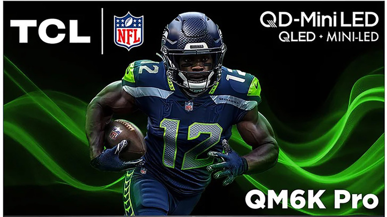 A TCL QM6K Pro television screen showing an American football player in action.