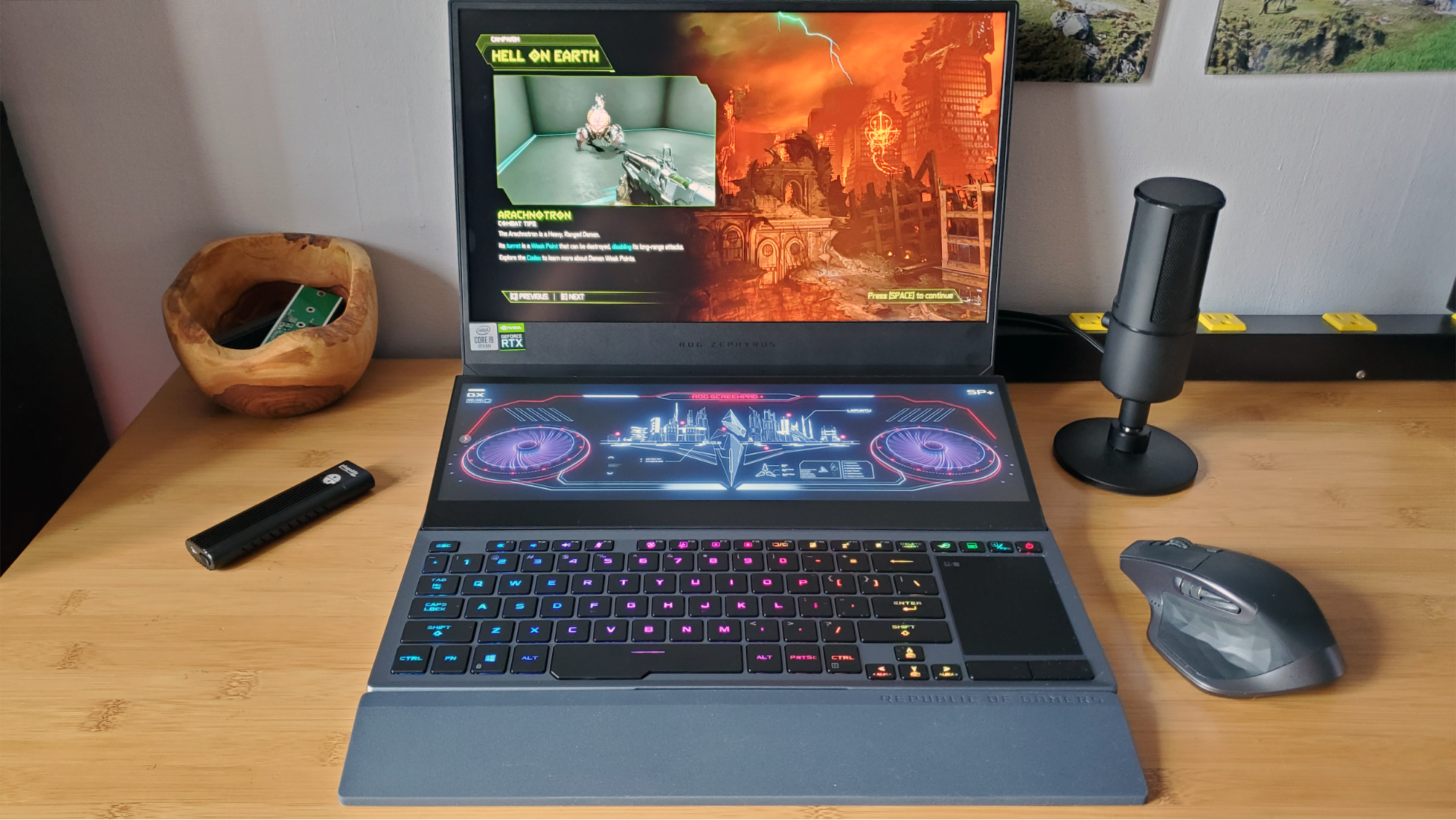 Asus ROG Zephyrus Duo with a secondary rising screen, showcasing complex mechanical and thermal engineering.