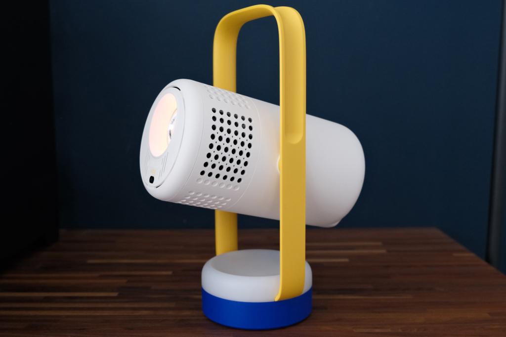 A summary graphic for the XGIMI Vibe One review featuring the projector and its remote.