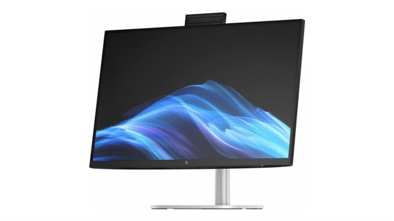 The HP EliteStudio All-in-One desktop PC with a sleek silver design.