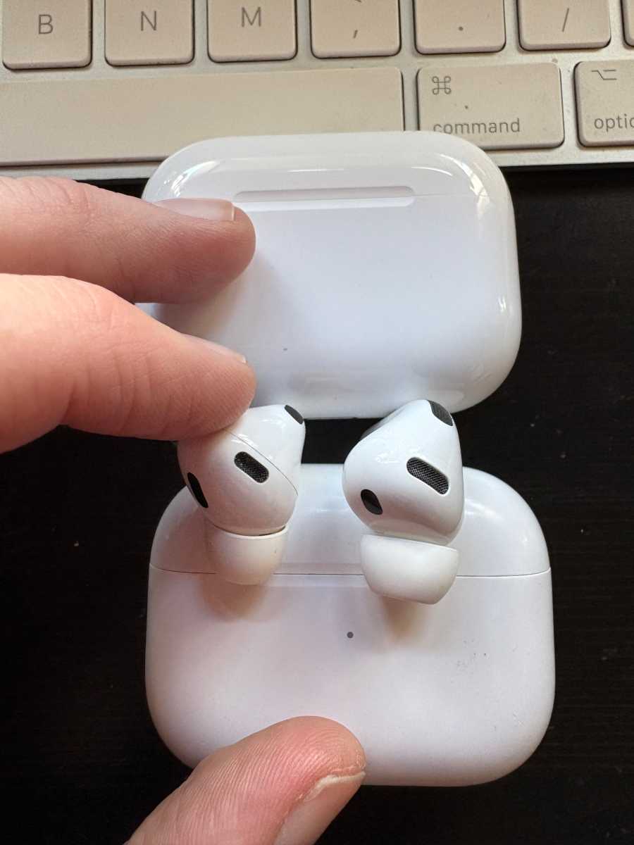 Side-by-side comparison of AirPods Pro 2 and the newer AirPods Pro 3 design.