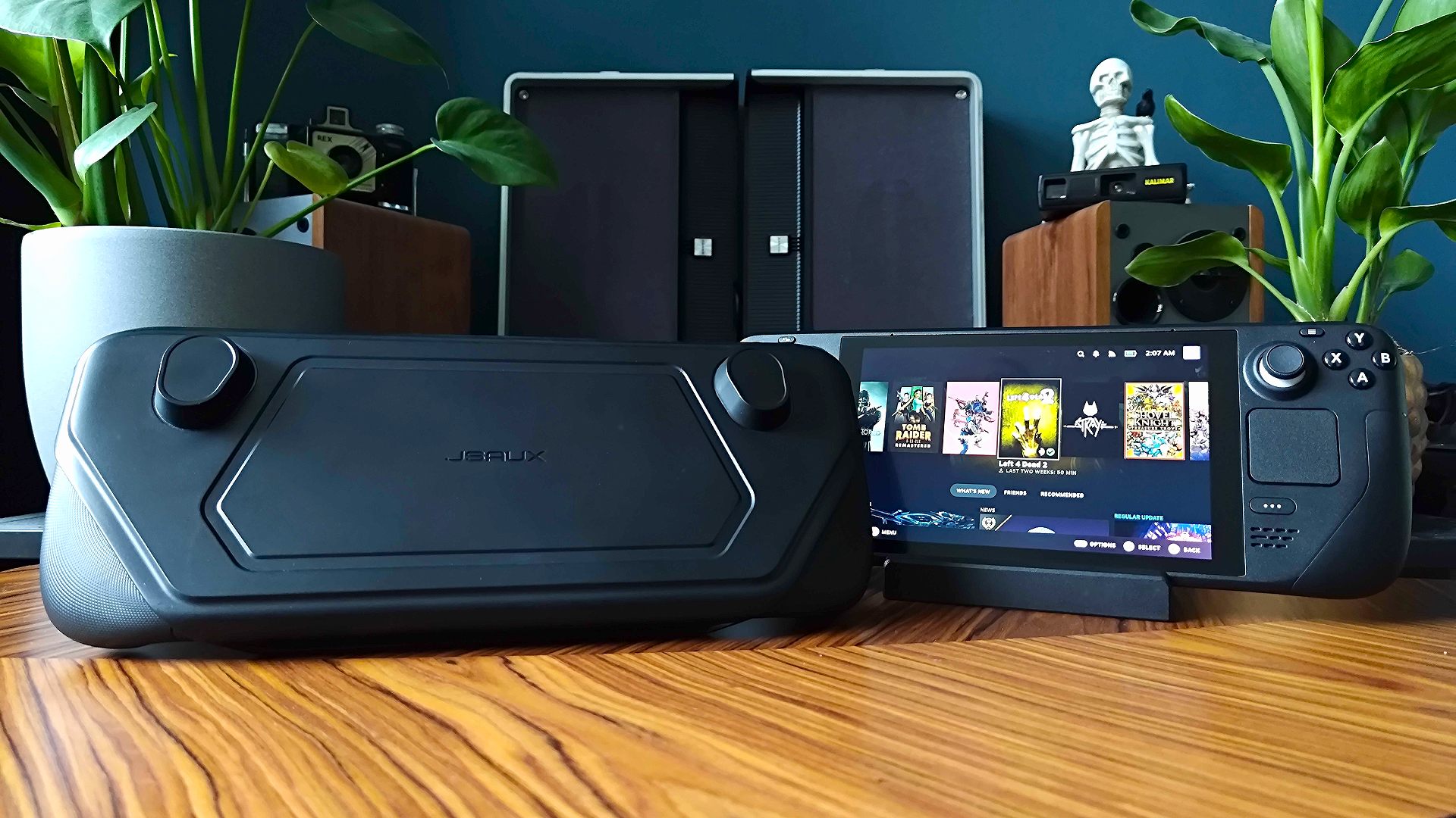 The Jsaux ModCase installed on a Steam Deck, resting on a wooden surface.