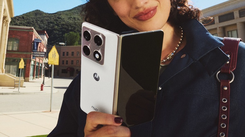 The back of the Motorola Razr Fold showcasing its camera array and tactile finish.