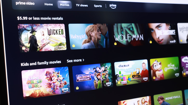 A close-up of the Fire TV interface on a television screen showing the Prime Video home row.