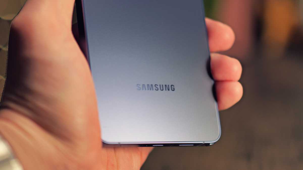 A person playing a graphically intensive mobile game on the Galaxy S26 Ultra's 6.9-inch display.