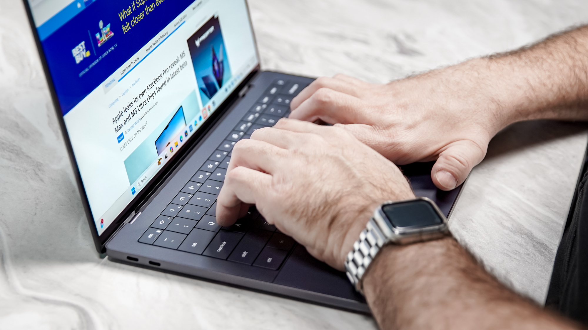 Front-facing view of the Dell XPS 14 showcasing the thin InfinityEdge bezels and vibrant screen.