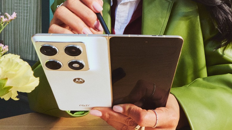 A sleek view of the Motorola Razr Fold hardware in its semi-folded state.