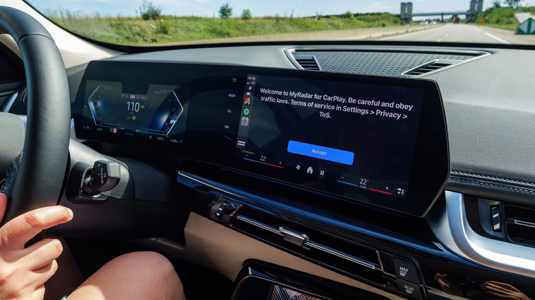 MyRadar weather application running on a car's infotainment console screen.