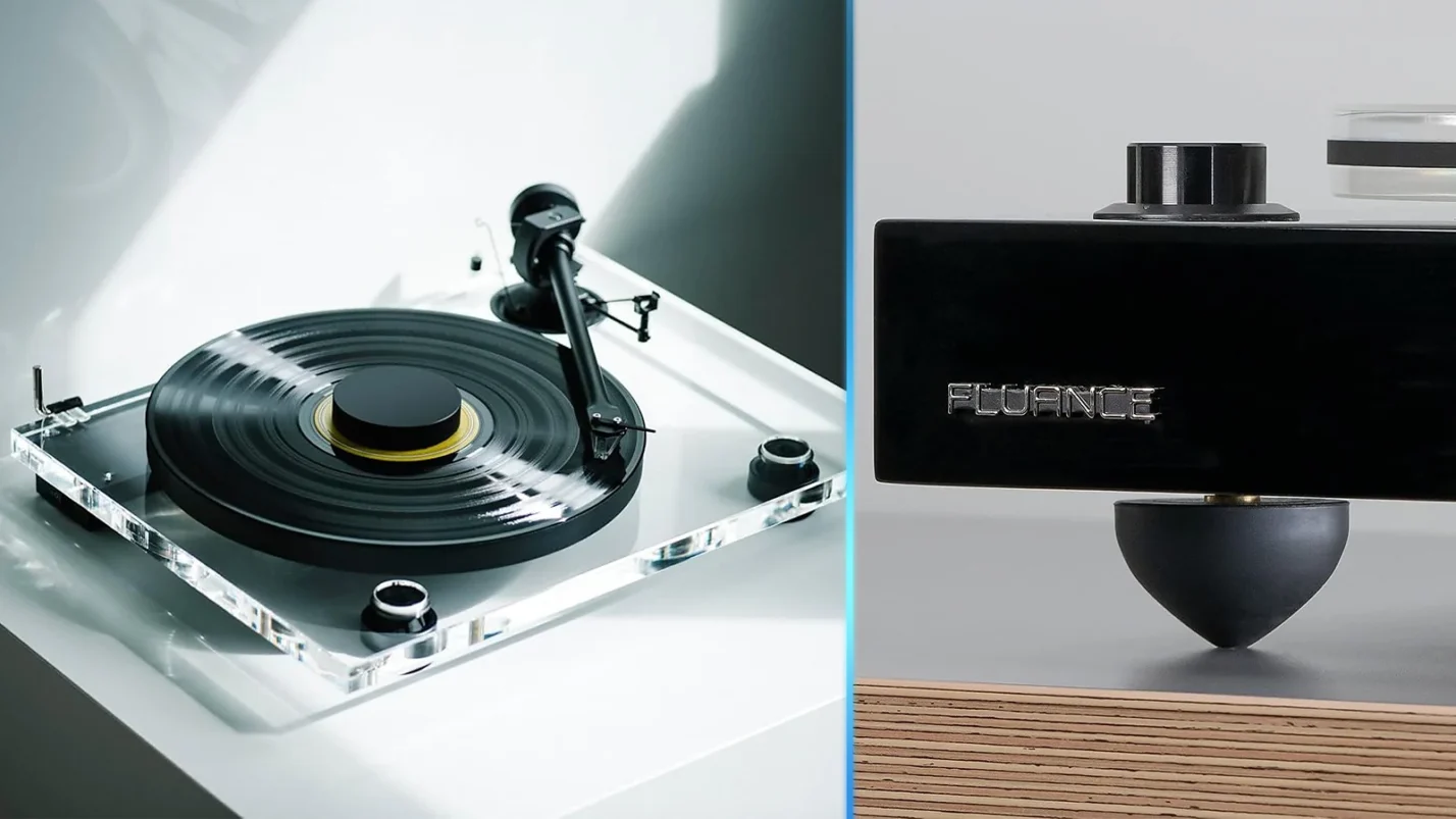 Close-up of a high-end turntable platter and isolation feet designed to reduce vibration.