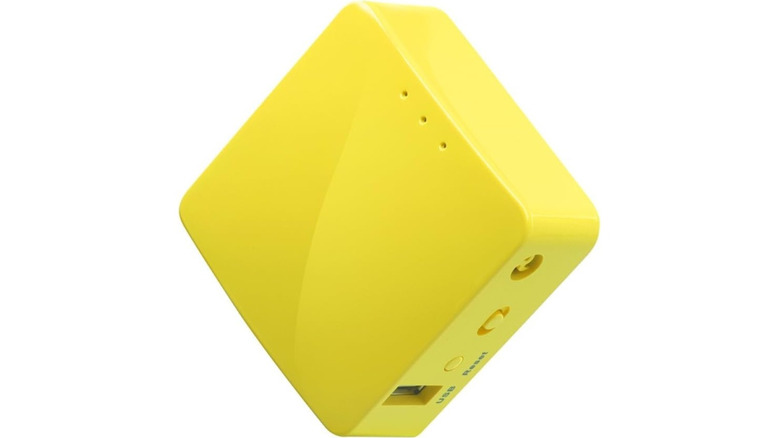 Yellow GL.iNet Mango Mini Travel Router shown against a clean white background.