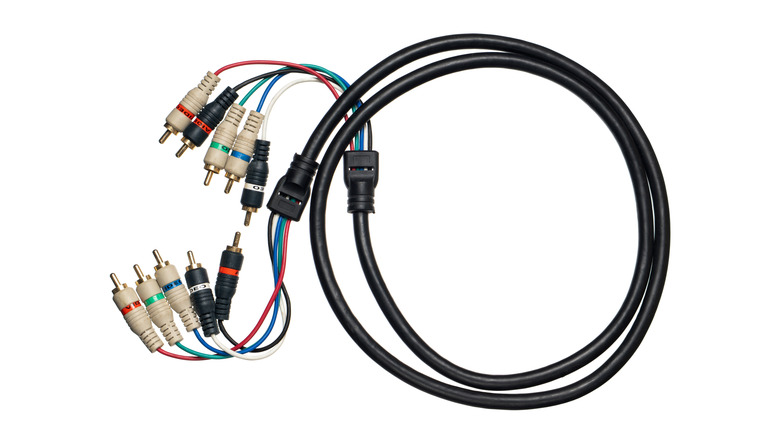 A set of component video cables with red, green, and blue connectors alongside audio plugs.