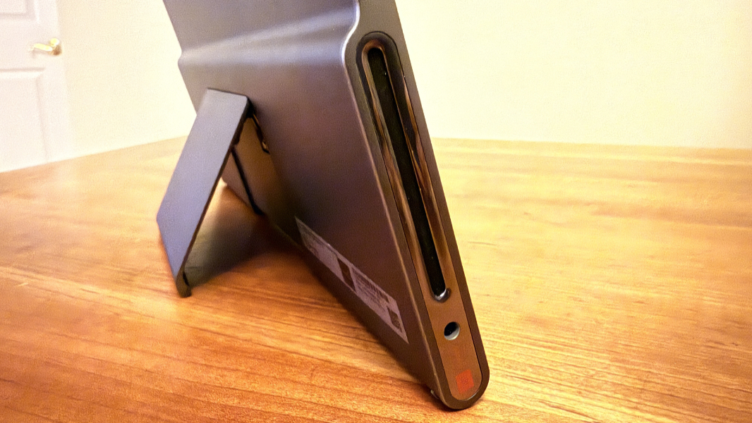 Close-up of the large JBL speaker box and woofer ports on the Lenovo Tab Plus.