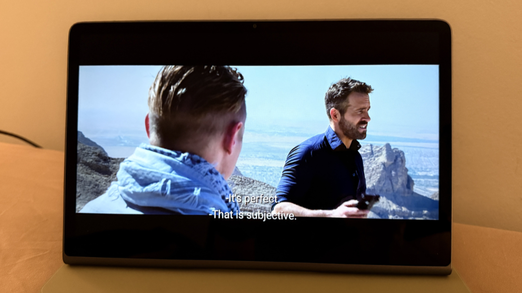 Lenovo Tab Plus playing a movie with the Dolby Atmos logo visible on the screen.