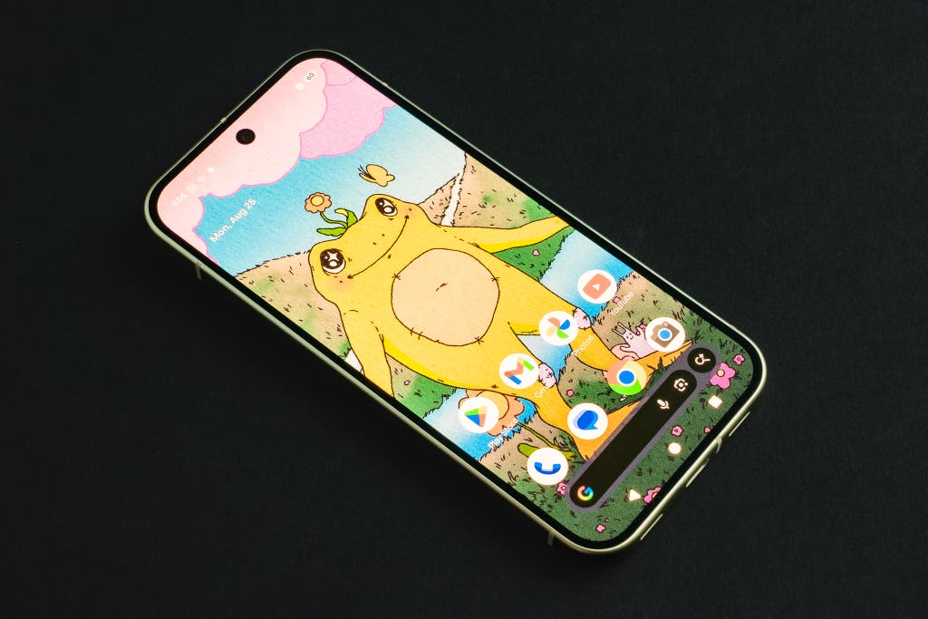 Front view of a Google Pixel phone showing a clean and colorful Android home screen.