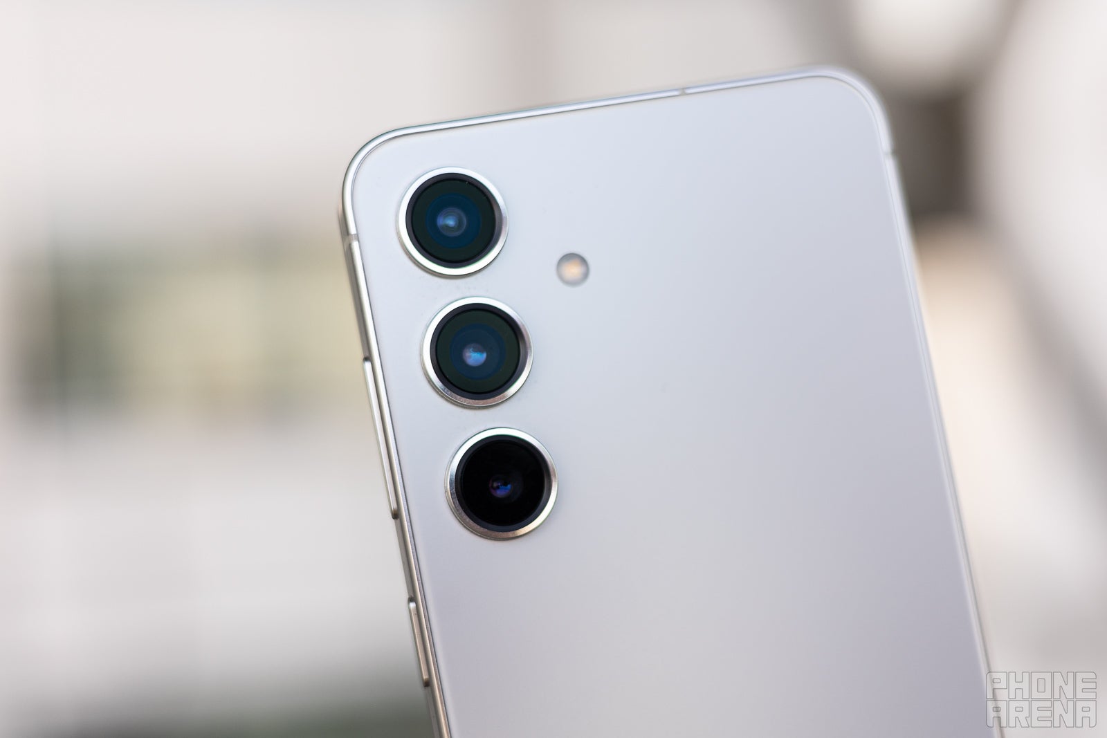 Macro view of the Samsung Galaxy S24 triple camera array.