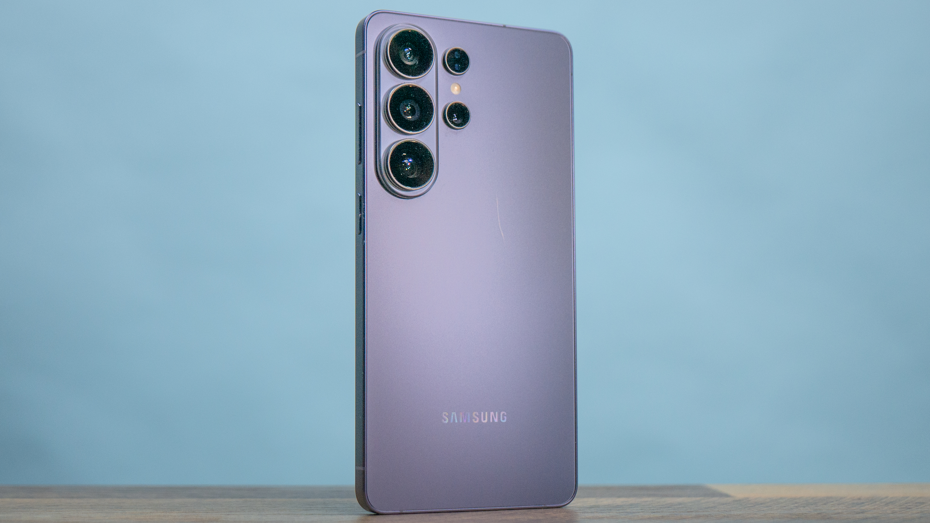 A person holding the Samsung Galaxy S26 Ultra, showing its large screen and AI-integrated interface.