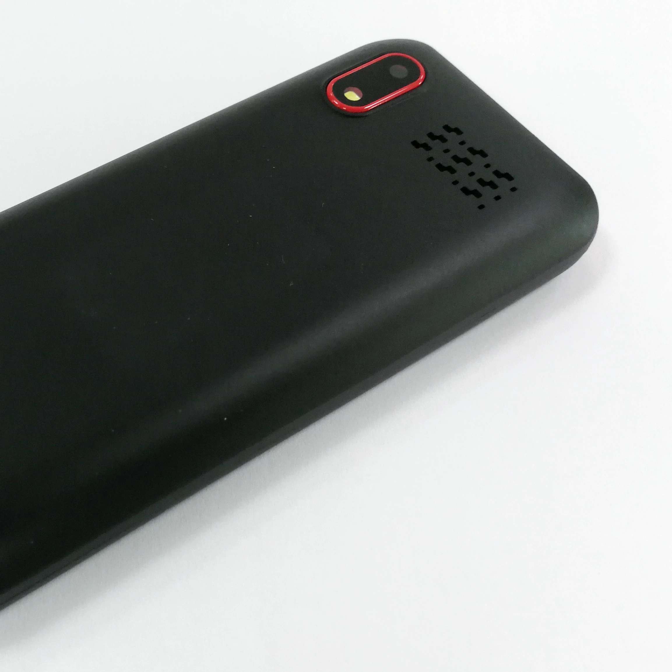 Side profile of three different 4G feature phones showing various thicknesses and button styles.