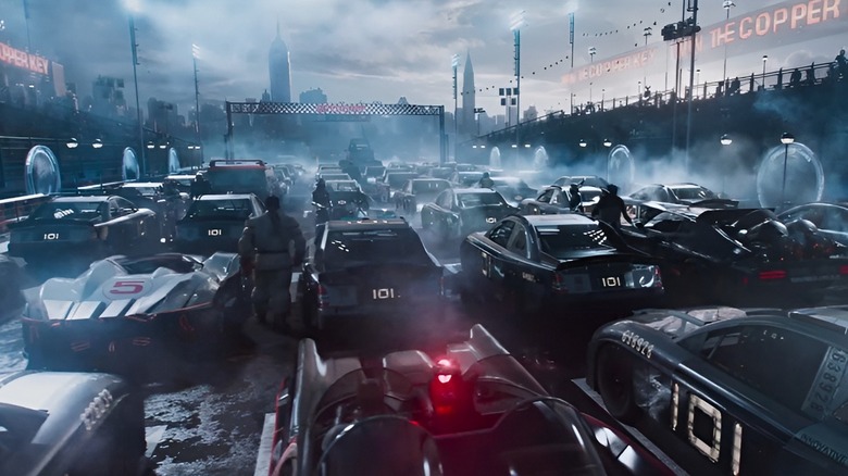 Crowded highway race scene from the movie Ready Player One showing high-speed action.
