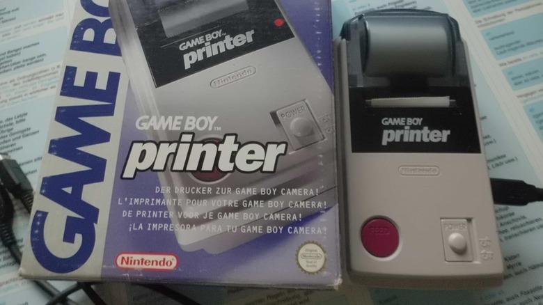 The original Game Boy Printer peripheral outside of its packaging.