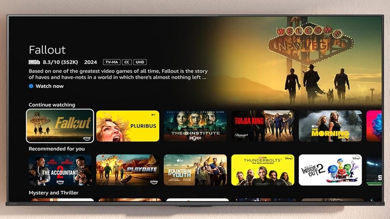 A wall-mounted Hisense U7SF smart TV with a slim bezel design.