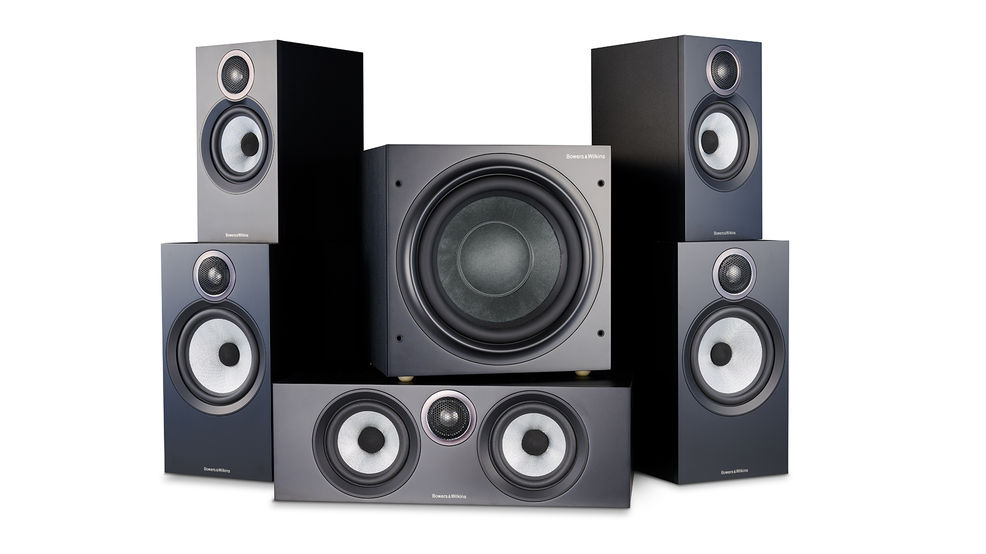 A complete setup of Bowers & Wilkins 606 and 607 S3 surround speakers in a living room.