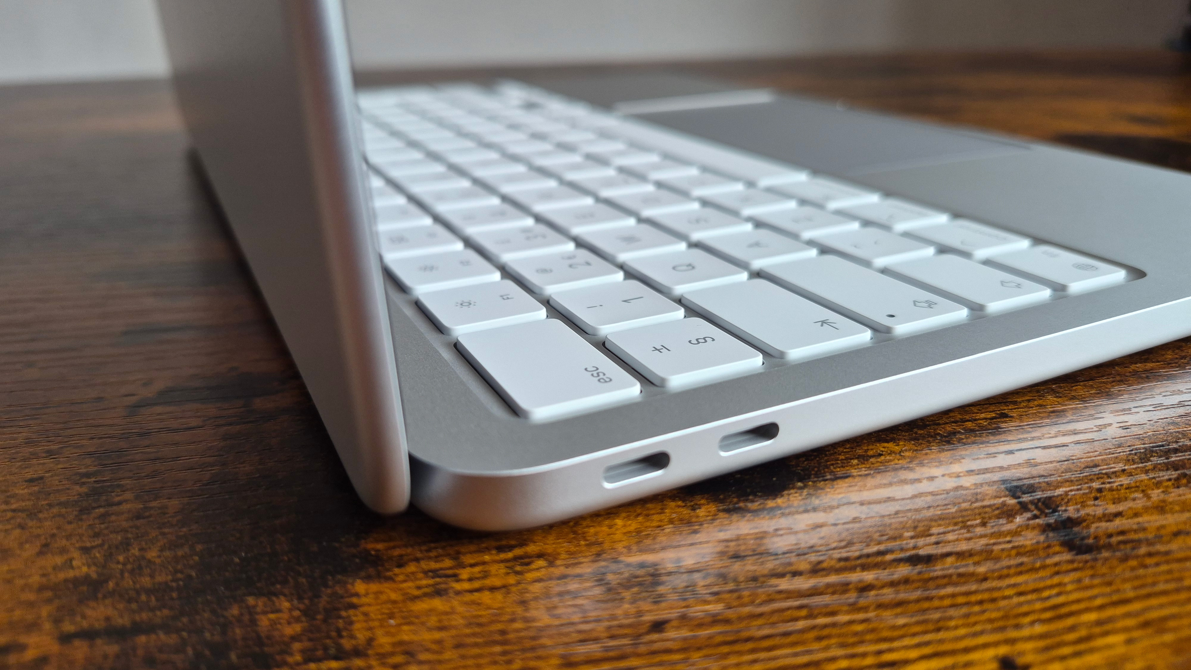 A person using the MacBook Neo for productivity applications like web browsing and light editing.